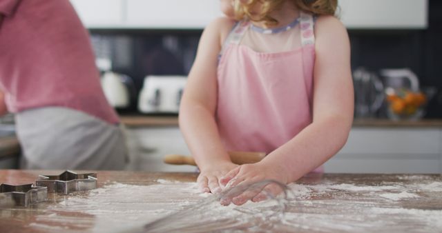 Little Girl Baking Cookies in Kitchen with Rolling Pin and Cookie Cutters - Download Free Stock Images Pikwizard.com