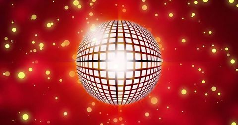 Illuminated Disco Ball with Vibrant Yellow Spots on Red - Download Free Stock Images Pikwizard.com