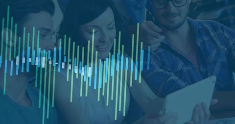 Diverse Team Engaged in Data Analysis on Tablet Device