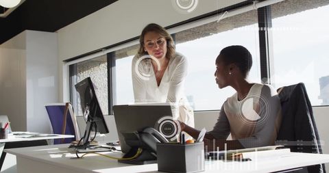 Diverse Business Professionals Analyzing Digital Data Trends