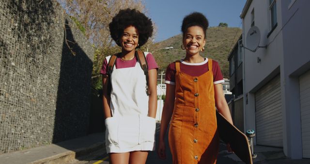 Two Smiling Young Women Walking Outdoors in Summer - Download Free Stock Images Pikwizard.com