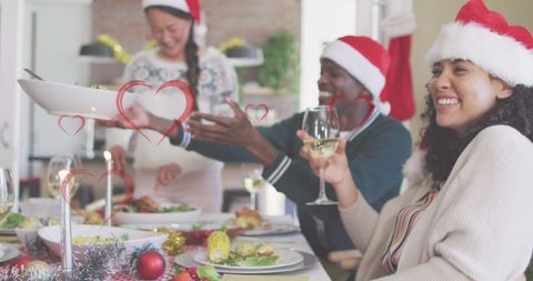 Diverse Friends Enjoying Christmas Dinner Celebration Together