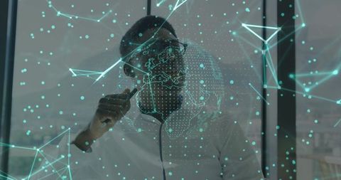 Businessman Analyzing Digital World Map and Networking Data