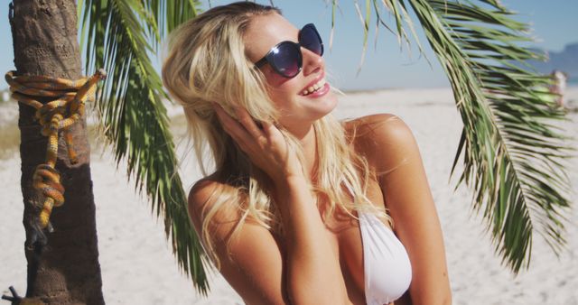 Happy Woman in White Bikini Enjoying Tropical Beach Vacation - Download Free Stock Photos Pikwizard.com