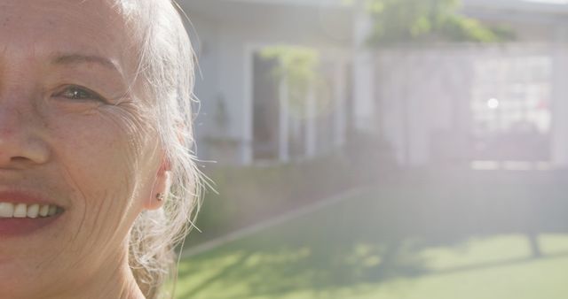 Close-Up of Senior Woman's Face Outside Modern Home - Download Free Stock Images Pikwizard.com