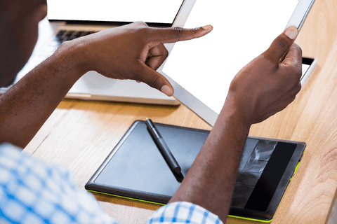 Businessman Engagement with Transparent Tablet at Work Desk - Download Free Stock Videos Pikwizard.com