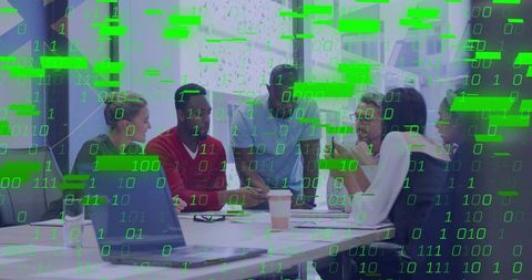 Team collaborating on cybersecurity strategy with binary data overlay in modern office