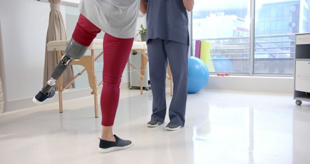 Physiotherapist Assisting in Rehabilitation of Patient with Prosthetic Leg - Download Free Stock Images Pikwizard.com