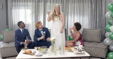 New Bride Cheers to Friends in Cozy Reception Toast Celebration
