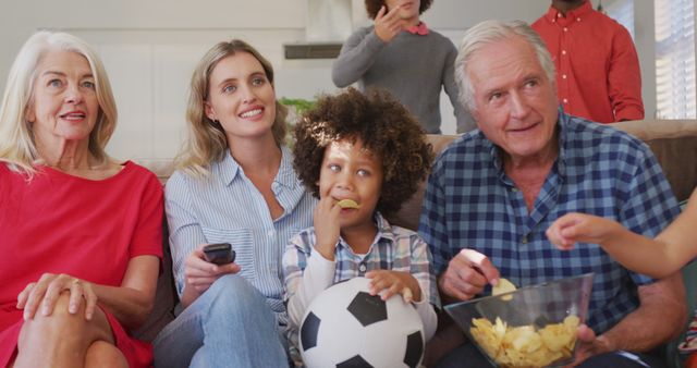 Multigenerational Family Watching TV Together at Home - Download Free Stock Images Pikwizard.com