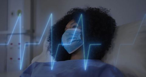 Biracial Female Patient with Cardiograph Overlay in Hospital