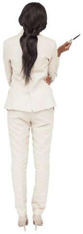 Rear view of businesswoman using transparent remote control