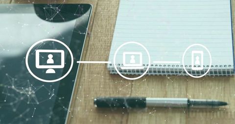 Tablet and notebook networking concept with device icons on wooden desk workspace