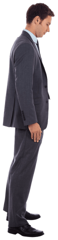 Serious Businessman in Profile on Transparent Background