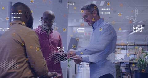 Collaborating team analyzing in modern open-plan workspace