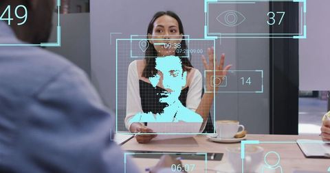 Businesswoman with social media interactions in modern office
