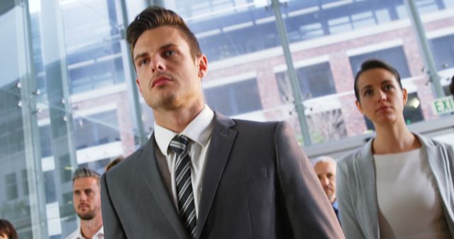 Confident Business Professionals in Modern Office Building - Download Free Stock Images Pikwizard.com