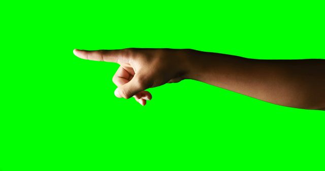 Caucasian female hand extends index finger on green screen background, suggesting direction or indicating something important. Useful for instructional, directional, or sign usage in educational videos, mobile apps, or advertising material.