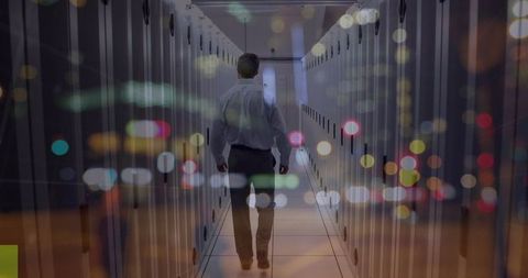IT Technician Navigating Data Center Aisle Ambient Lights Botanical Effect