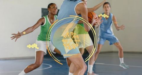 Female basketball players defending player holding ball with augmented reality hud overlay