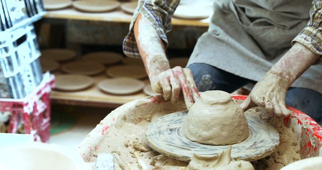 Potter's Hands Shaping Clay on Wheel - Download Free Stock Images Pikwizard.com