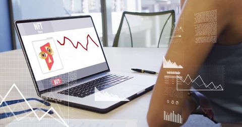 Woman Analyzing NFT Market Trends on Laptop in Office