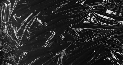 Dynamic Metallic Textures on Reflective Black Surface - Download Free Stock Images Pikwizard.com