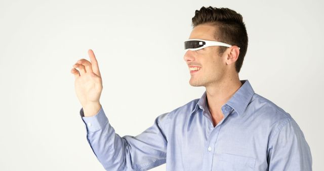 Man using AR glasses for virtual interaction - Download Free Stock Images Pikwizard.com