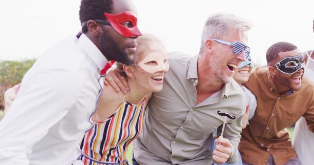 Diverse Friends Celebrating with Masks - Download Free Stock Images Pikwizard.com