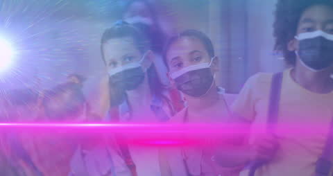 Diverse Students Lined Up Wearing Masks with Vivid Light Effects