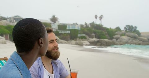 Couple Enjoying Cocktails on Serene Beach