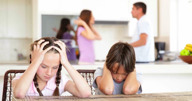 This scenario shows two children appearing upset and covering their ears while their parents argue in the background of a modern home environment. This image can be used to illustrate family conflicts, parenting issues, emotional stress on children, and the impacts of relationship problems. It is suitable for articles, blogs, or counseling and therapy services aimed at addressing family dynamics and mental health.