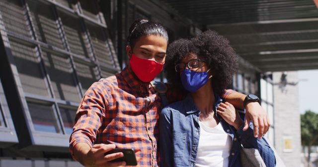 Young Couple Wearing Masks Taking Selfie Outdoors - Download Free Stock Images Pikwizard.com