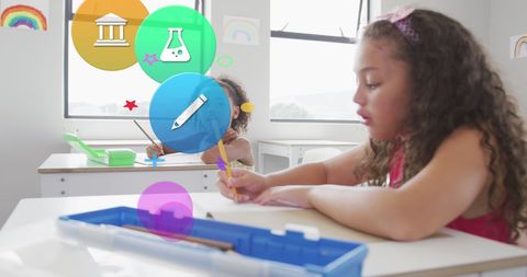 Diverse Schoolgirls Engaged in Classroom Learning with Educational Icons