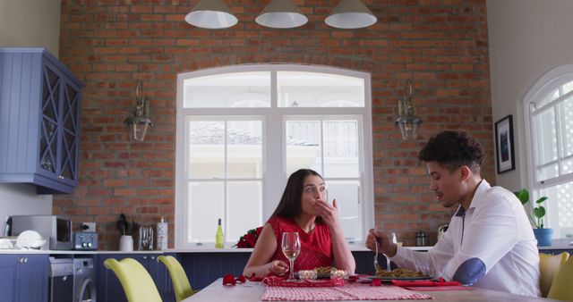 Happy biracial couple having valentine's day celebration meal at home - Download Free Stock Photos Pikwizard.com