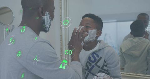 Father and Son Applying Shaving Foam Together in Bathroom Mirror with Holographic HUD