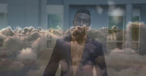 Ambitious Young Businessman Gazing Through Virtual Clouds - Download Free Stock Images Pikwizard.com