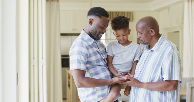 Three Generations of African American Men Sharing a Special Moment Indoors - Download Free Stock Images Pikwizard.com