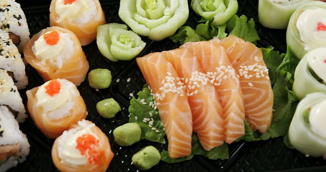 Delicious Assortment of Fresh Sushi and Sashimi with Salmon and Vegetables - Download Free Stock Images Pikwizard.com