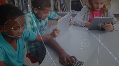 Children Engaging With Technology in School Library