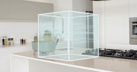 Holographic code cube hovering above kitchen island projecting ui around chrome faucet