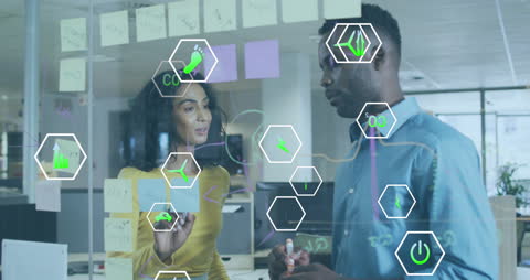 Diverse Coworkers Brainstorming with Futuristic Technologies