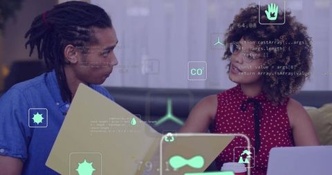 Collaborating on ar analytics and visualization while reviewing laptop on cozy sofa