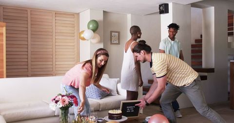 Friends Celebrating Birthday in Cozy Home