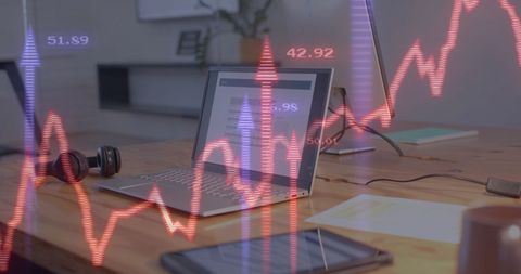 Financial Data Overlaid on Laptop at Office Desk - Download Free Stock Images Pikwizard.com