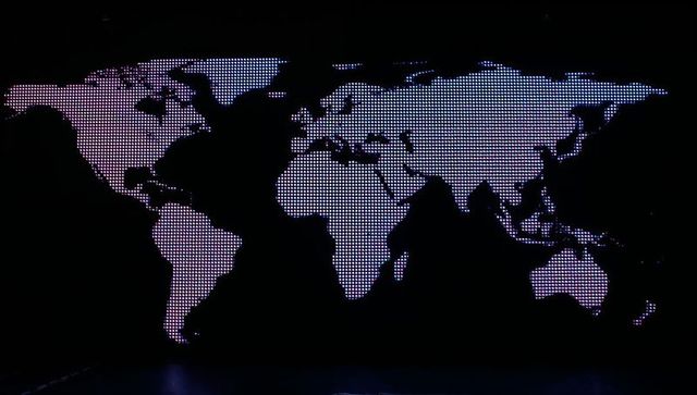 Dotted world map on led screen with gradient lights