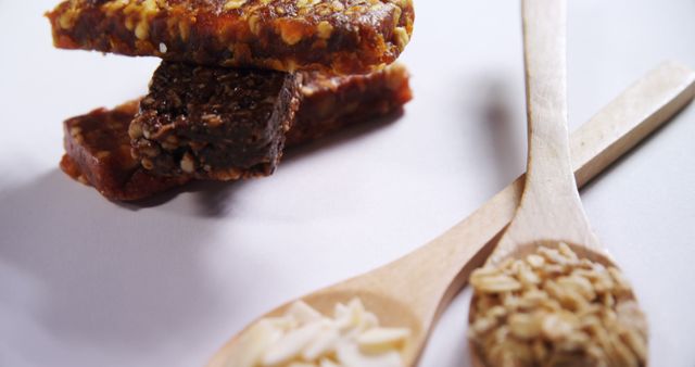 Close-up of Fruit and Nut Bars with Wooden Spoons - Download Free Stock Images Pikwizard.com