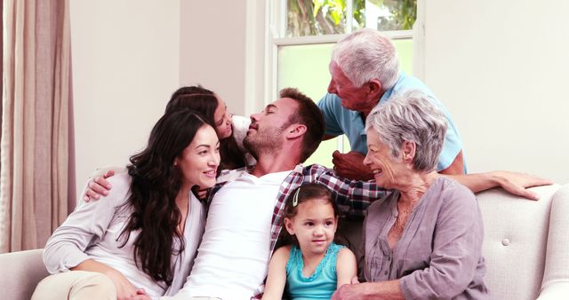 Happy Multigenerational Family Spending Quality Time Together on Sofa - Download Free Stock Images Pikwizard.com