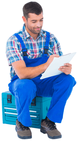 handyman sitting on toolbox reviewing document, transparent background - Download Free Stock Videos Pikwizard.com