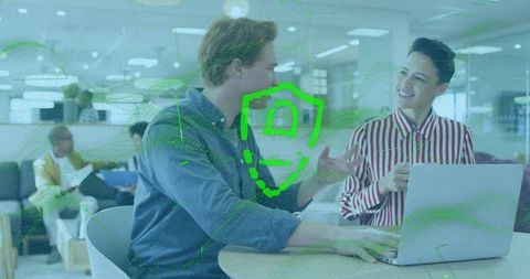 Colleagues Collaborating in Modern Office with Digital Security Overlay